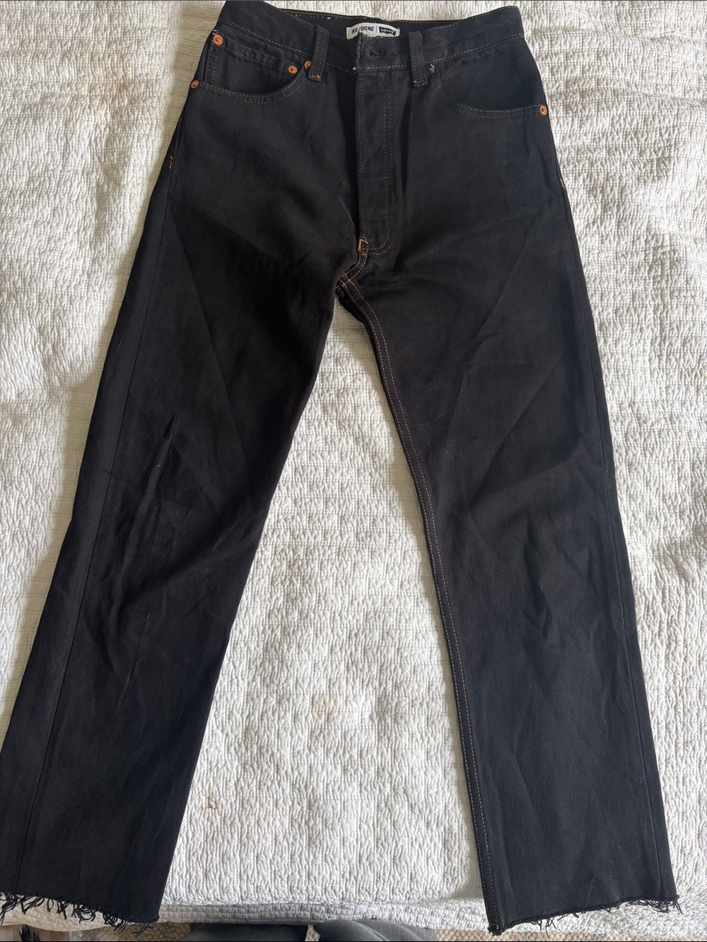 Re/Done 70’s Black high rise stove pipe straight leg ankle